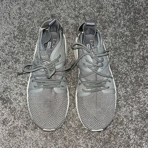 Gray Puma athletic shoes